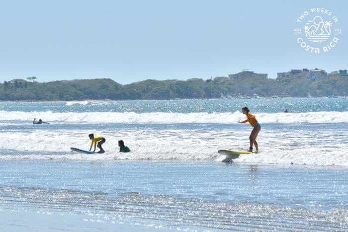 Mom and son surfing together