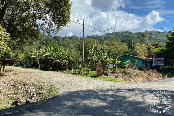 A gravel road entrance