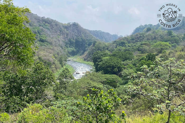 Virilla River flowing through a valley with surrounding mountains