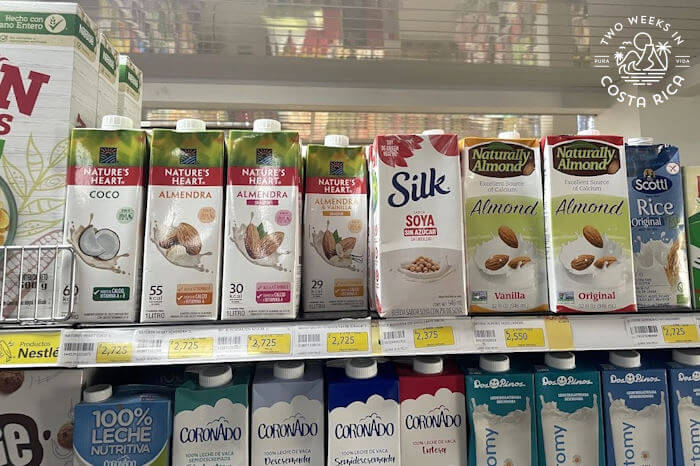 Grocery store shelf in Costa Rica with almond, soy, and rice milk options